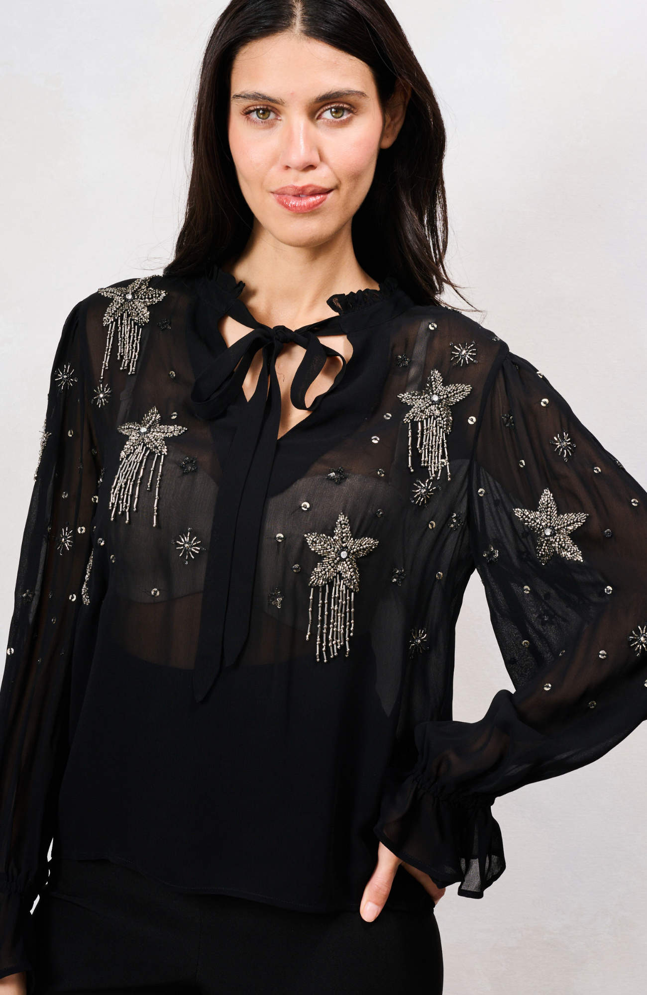 The Elaris Top