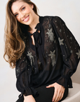 The Elaris Top